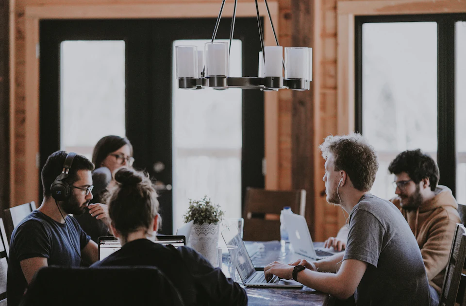 Small business team collaborating around a table