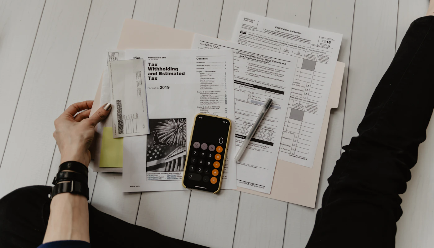 Printed invoices and financial documents on a desk
